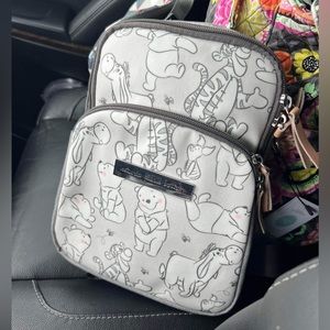 Petunia Pickle Bottom Winnie the Pooh Sling Bag